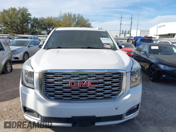 2019 GMC Yukon XL Denali with VIN 1GKS1HKJ8KR378385, listed as a IAAI auction lot 41824529 with 115,481 mi miles. Bid and sale history available at carsss.com. Image 6.