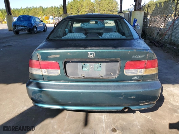 1999 Honda Civic DX with VIN 1HGEJ6224XL039608, listed as a Copart auction lot 77788394 with 292,199 mi miles and Clean Title. Bid and sale history available at carsss.com. Image 6.