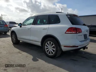 2017 Volkswagen Touareg Sport with VIN WVGEF7BP0HD006792, listed as a Copart auction lot 47895813 with 52,432 mi miles and . Bid and sale history available at DreamBid. Image 2.