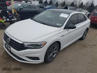 2021 Volkswagen Jetta S with VIN 3VWN57BU0MM006171, listed as a IAAI auction lot 41611632 with 64,283 mi miles. Bid and sale history available at carsss.com. Image 2.