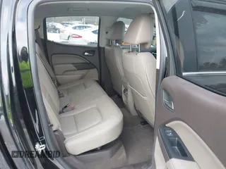 2015 GMC Canyon 4WD SLT with VIN 1GTG6CE39F1202730, listed as a IAAI auction lot 41510275 with 114,444 mi miles. Bid and sale history available at carsss.com. Image 8.
