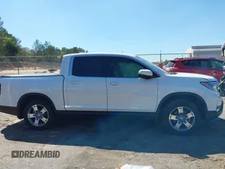 2024 Honda Ridgeline RTL z VIN 5FPYK3F54RB026656, wystawiony jako IAAI lot #41878732 z przebiegiem 15 585 mil mil oraz . Historia ofert i sprzedaży dostępna na DreamBid. Obrazek 13.