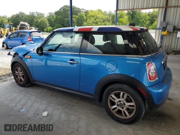 2011 MINI Hardtop with VIN WMWSU3C52BT252207, listed as a Copart auction lot 62735905 with 121,121 mi miles and Salvage title. Bid and sale history available at DreamBid. Image 2.