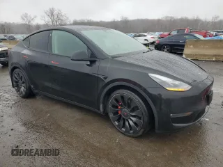 2022 Tesla Model Y Performance z VIN 7SAYGDEF9NF382883, wystawiony jako Copart lot #52028085 z przebiegiem 49 108 mil mil oraz Szkoda całkowita • Salvage title. Historia ofert i sprzedaży dostępna na DreamBid. Obrazek 4.