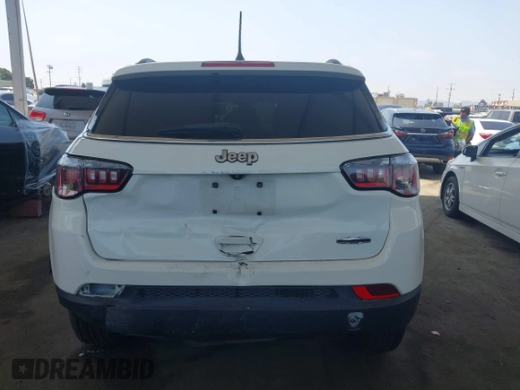 2020 Jeep Compass Latitude with VIN 3C4NJCBB8LT141375, listed as a IAAI auction lot 42382374 with 63,799 mi miles and . Bid and sale history available at DreamBid. Image 17.