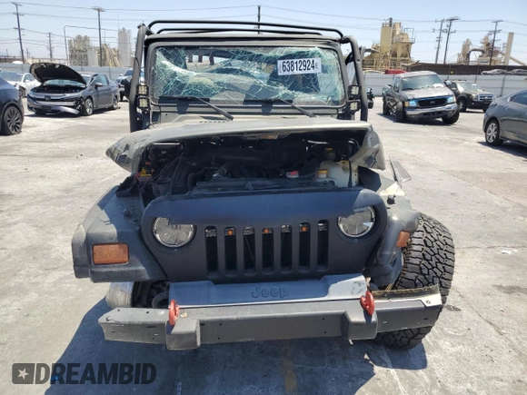 1997 Jeep Wrangler SE with VIN 1J4FY29P2VP438901, listed as a Copart auction lot 63812924 with 0 mi miles and Salvage Title. Bid and sale history available at carsss.com. Image 5.