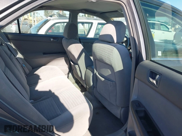 2005 Toyota Camry LE with VIN 4T1BF32K35U590150, listed as a IAAI auction lot 41614295 with 180,627 mi miles and . Bid and sale history available at DreamBid. Image 8.