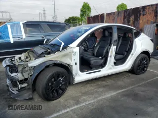 2023 Tesla Model Y Long Range z VIN 7SAYGDEE2PA025536, wystawiony jako Copart lot #53074445 z przebiegiem 39 755 mil mil oraz Szkoda całkowita • Salvage title. Historia ofert i sprzedaży dostępna na DreamBid. Obrazek 1.