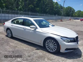 2018 BMW 7 Series 740i with VIN WBA7E2C59JG742941, listed as a IAAI auction lot 42322402 with 92,600 mi miles and . Bid and sale history available at DreamBid. Image 1.