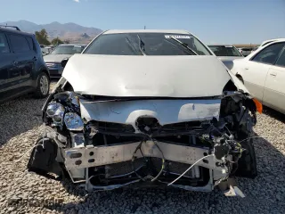 2012 Toyota Prius Plug-In with VIN JTDKN3DP9C3019460, listed as a Copart auction lot 71377474 with 100,689 mi miles and Salvage Title. Bid and sale history available at carsss.com. Image 5.