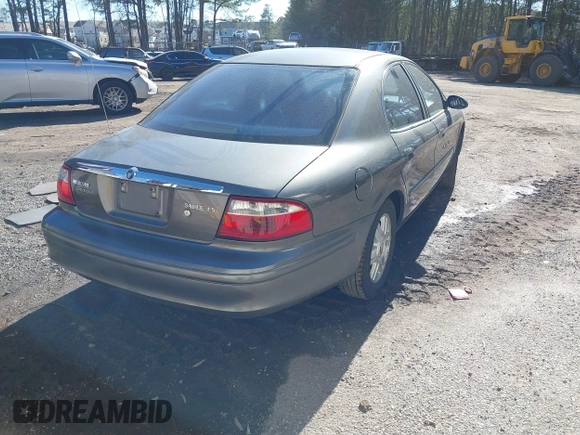 2004 Mercury Sable LS Premium z VIN 1MEHM55S54G607845, wystawiony jako IAAI lot #41812758 z przebiegiem 200 883 mil mil oraz . Historia ofert i sprzedaży dostępna na DreamBid. Obrazek 4.