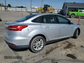 2015 Ford Focus SE with VIN 1FADP3F28FL241020, listed as a Copart auction lot 54559135 with 123,008 mi miles and Salvage title. Bid and sale history available at DreamBid. Image 3.