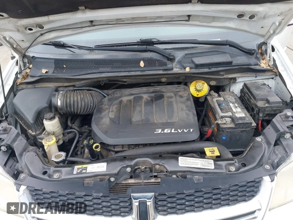 2014 Dodge Grand Caravan SXT with VIN 2C4RDGCG1ER304836, listed as a IAAI auction lot 42049558 with 186,831 mi miles and . Bid and sale history available at DreamBid. Image 10.