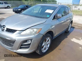 2010 Mazda CX-7 Touring with VIN JM3ER2W31A0348858, listed as a IAAI auction lot 42084790 with 136,261 mi miles. Bid and sale history available at carsss.com. Image 2.
