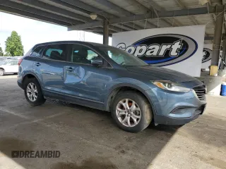 2015 Mazda CX-9 Touring z VIN JM3TB3CV2F0467257, wystawiony jako Copart lot #55896725 z przebiegiem 146 877 mil mil oraz Czysty tytuł • Clean title. Historia ofert i sprzedaży dostępna na DreamBid. Obrazek 4.