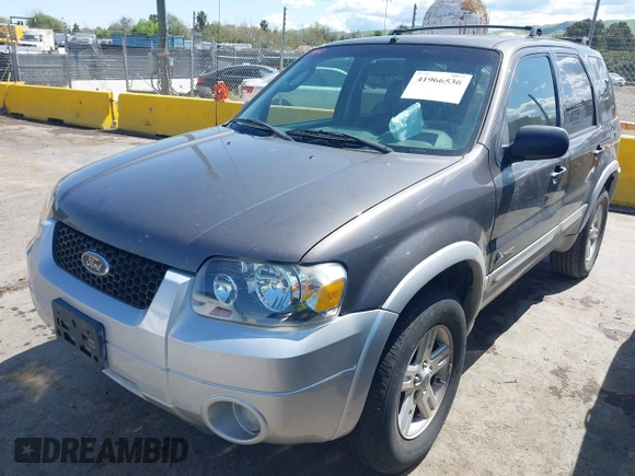 2006 Ford Escape Hybrid with VIN 1FMCU96H86KC82075, listed as a IAAI auction lot 41966536 with 91,270 mi miles and . Bid and sale history available at DreamBid. Image 2.