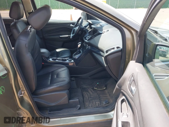 2013 Ford Escape Titanium with VIN 1FMCU9J98DUC45917, listed as a IAAI auction lot 42503892 with 173,284 mi miles and . Bid and sale history available at DreamBid. Image 5.