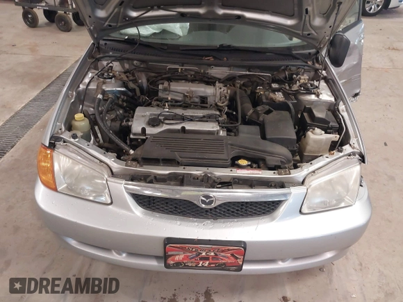 2000 Mazda Protege DX with VIN JM1BJ2226Y0206340, listed as a IAAI auction lot 41645396 with 238,500 mi miles and . Bid and sale history available at DreamBid. Image 10.