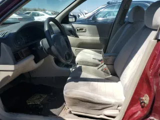 1995 Nissan Altima XE z VIN 1N4BU31D8SC164328, wystawiony jako Copart lot #65999624 z przebiegiem 196 247 mil mil oraz Szkoda całkowita • Salvage title. Historia ofert i sprzedaży dostępna na DreamBid. Obrazek 7.