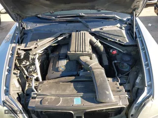2009 BMW X5 30i with VIN 5UXFE43559L263332, listed as a IAAI auction lot 41998651 with 209,264 mi miles. Bid and sale history available at carsss.com. Image 10.