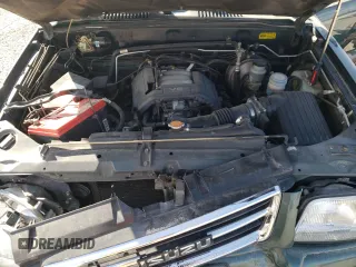 1999 Isuzu Trooper S z VIN JACDJ58X6X7912709, wystawiony jako Copart lot #75357874 z przebiegiem 138 332 mil mil oraz Szkoda całkowita • Salvage title. Historia ofert i sprzedaży dostępna na DreamBid. Obrazek 12.