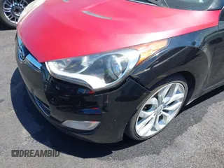 2012 Hyundai Veloster w/Gray Int с VIN KMHTC6AD4CU070537, выставлен на аукционе IAAI как лот 42202272 с пробегом 120 054 миль миль и . История ставок и продаж доступна на DreamBid. Изображение 6.