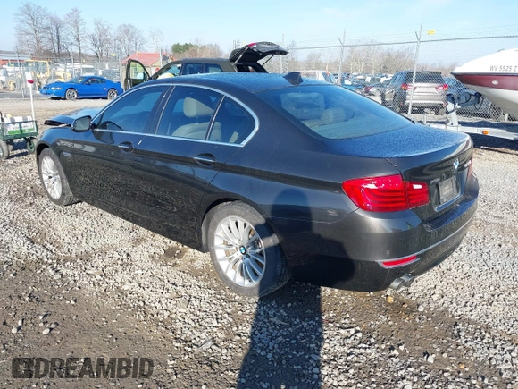 2014 BMW 5 Series 528i xDrive with VIN WBA5A7C54ED616297, listed as a IAAI auction lot 41877809 with 147,874 mi miles and . Bid and sale history available at DreamBid. Image 3.