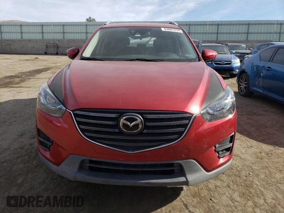 2016 Mazda CX-5 Grand Touring with VIN JM3KE4DYXG0850270, listed as a Copart auction lot 83681274 with 121,486 mi miles and Salvage Title. Bid and sale history available at carsss.com. Image 5.