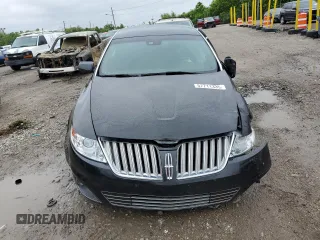 2010 Lincoln MKS z VIN 1LNHL9DR5AG601996, wystawiony jako Copart lot #57711335 z przebiegiem Nie podano mil oraz Szkoda całkowita • Salvage title. Historia ofert i sprzedaży dostępna na DreamBid. Obrazek 5.