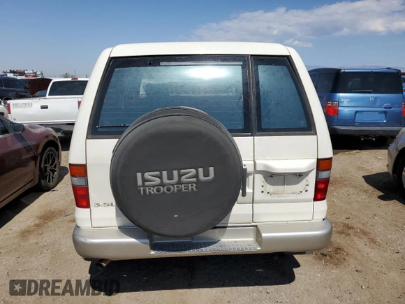 1999 Isuzu Trooper S z VIN JACDJ58X6X7912631, wystawiony jako Copart lot #74153604 z przebiegiem 141 037 mil mil oraz Szkoda całkowita • Salvage title. Historia ofert i sprzedaży dostępna na DreamBid. Obrazek 6.