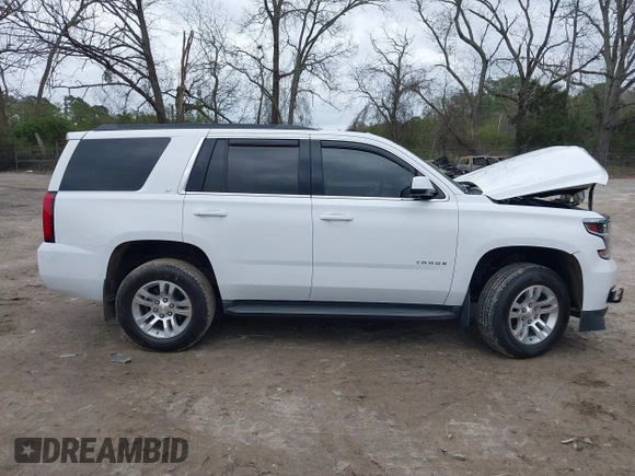2020 Chevrolet Tahoe LT with VIN 1GNSKBKC2LR253012, listed as a IAAI auction lot 41870002 with 127,789 mi miles and . Bid and sale history available at DreamBid. Image 13.