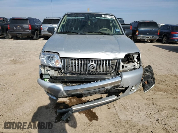 2005 Mercury Mariner Luxury z VIN 4M2YU56195DJ03528, wystawiony jako Copart lot #83315034 z przebiegiem 118 696 mil mil oraz Szkoda całkowita • Salvage title. Historia ofert i sprzedaży dostępna na DreamBid. Obrazek 5.