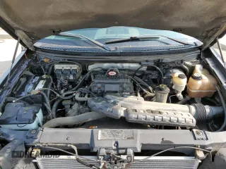 2006 Ford F-150 XLT with VIN 1FTPX14V76FB47864, listed as a Copart auction lot 60227005 with 185,824 mi miles and Salvage title. Bid and sale history available at DreamBid. Image 11.
