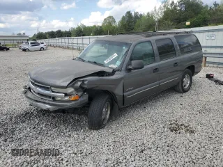 2000 Chevrolet Suburban LS with VIN 3GNEC16T0YG206860, listed as a Copart auction lot 52389045 with 196,405 mi miles and Salvage title. Bid and sale history available at DreamBid. Image 1.