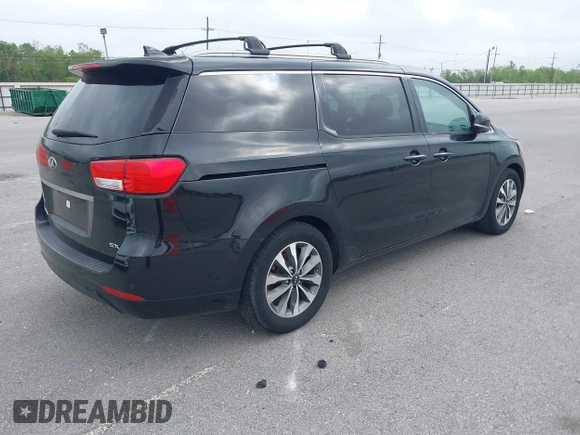 2015 Kia Sedona EX with VIN KNDMC5C11F6038255, listed as a IAAI auction lot 41968284 with 130,765 mi miles. Bid and sale history available at carsss.com. Image 4.