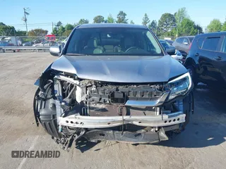 2020 Honda Pilot EX-L z VIN 5FNYF5H51LB016163, wystawiony jako IAAI lot #42030430 z przebiegiem 65 383 mil mil oraz . Historia ofert i sprzedaży dostępna na DreamBid. Obrazek 12.