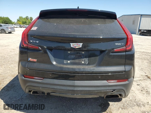 2023 Cadillac XT4 FWD Luxury z VIN 1GYAZAR46PF178003, wystawiony jako Copart lot #52024665 z przebiegiem 42 000 mil mil oraz Szkoda całkowita • Salvage title. Historia ofert i sprzedaży dostępna na DreamBid. Obrazek 6.