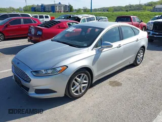 2014 Ford Fusion SE with VIN 3FA6P0H76ER127534, listed as a IAAI auction lot 42097749 with 127,863 mi miles. Bid and sale history available at carsss.com. Image 2.