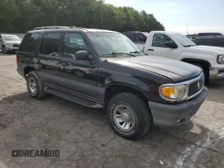 1999 Mercury Mountaineer z VIN 4M2DU52P9XUJ10152, wystawiony jako Copart lot #76283584 z przebiegiem 32 199 mil mil oraz Tytuł czysty. Historia ofert i sprzedaży dostępna na DreamBid. Obrazek 4.