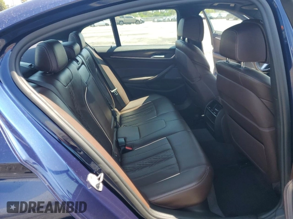 2018 BMW 5 Series 540i with VIN WBAJE5C51JWA94673, listed as a Copart auction lot 59807825 with 77,051 mi miles and Salvage title. Bid and sale history available at DreamBid. Image 10.