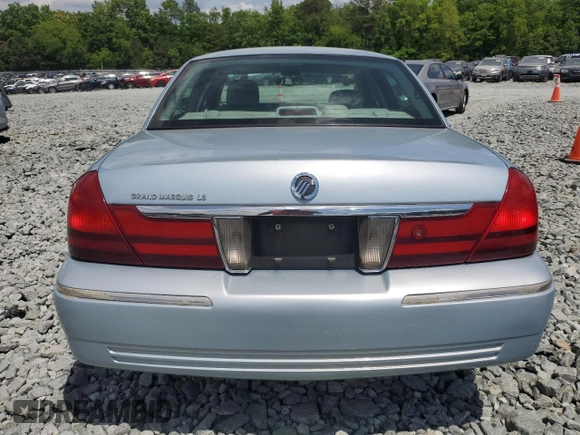 2003 Mercury Grand Marquis LS Premium с VIN 2MEFM75WX3X665058, выставлен на аукционе Copart как лот 55266225 с пробегом 120 904 миль миль и Списание • Salvage title. История ставок и продаж доступна на DreamBid. Изображение 6.