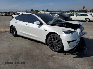 2021 Tesla Model 3 Performance z VIN 5YJ3E1EC1MF075451, wystawiony jako Copart lot #60354235 z przebiegiem 52 662 mil mil oraz Szkoda całkowita • Salvage title. Historia ofert i sprzedaży dostępna na DreamBid. Obrazek 4.