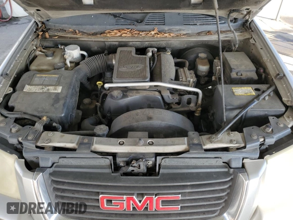 2005 GMC Envoy SLE with VIN 1GKDS13S852374516, listed as a Copart auction lot 42409725 with 299,816 mi miles and Salvage Title. Bid and sale history available at carsss.com. Image 12.