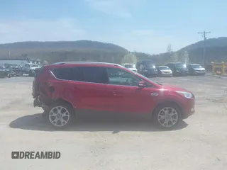 2015 Ford Escape Titanium with VIN 1FMCU9JX9FUB87463, listed as a IAAI auction lot 42059618 with 32,100 mi miles. Bid and sale history available at carsss.com. Image 13.