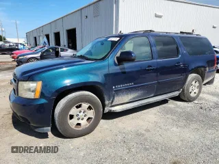 2007 Chevrolet Suburban LT with VIN 1GNFC16JX7J174760, listed as a Copart auction lot 64401315 with 287,442 mi miles and Salvage title. Bid and sale history available at DreamBid. Image 1.