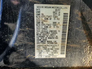 2007 Nissan Titan XE with VIN 1N6BA07A47N245317, listed as a Copart auction lot 82702474 with 230,066 mi miles and Salvage Title. Bid and sale history available at DreamBid. Image 12.
