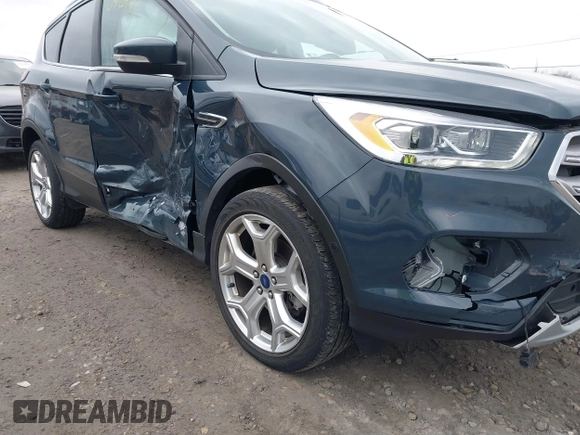 2019 Ford Escape Titanium with VIN 1FMCU9J95KUC28621, listed as a IAAI auction lot 41825297 with 60,373 mi miles. Bid and sale history available at carsss.com. Image 17.