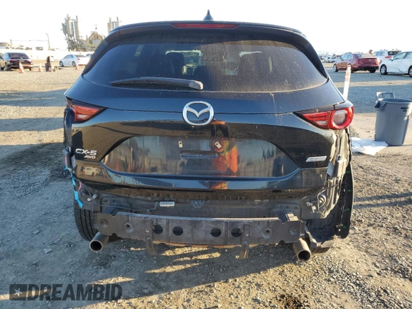 2018 Mazda CX-5 Grand Touring with VIN JM3KFBDMXJ0318474, listed as a Copart auction lot 46438545 with 58,702 mi miles and Salvage Title. Bid and sale history available at DreamBid. Image 6.