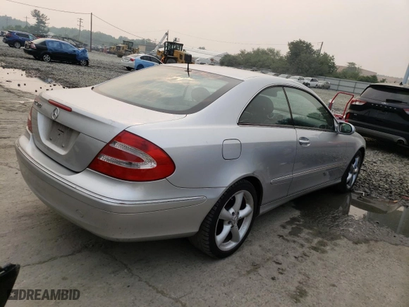 2004 Mercedes-Benz CLK-Class 3.2L with VIN WDBTJ65J74F072751, listed as a Copart auction lot 55059143 with 104,698 mi miles and Salvage Title. Bid and sale history available at carsss.com. Image 3.