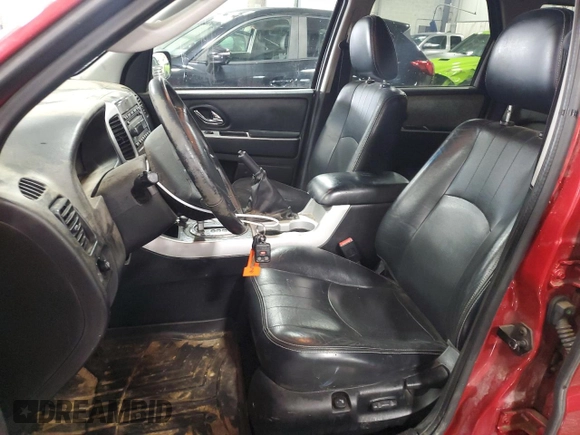 2007 Mercury Mariner Luxury with VIN 4M2YU91127KJ08616, listed as a Copart auction lot 42007945 with 196,691 mi miles and Salvage title. Bid and sale history available at DreamBid. Image 7.